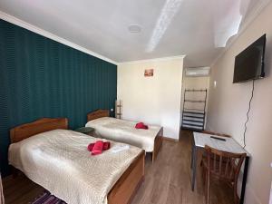 Letto o letti in una camera di Hotel-GVALA