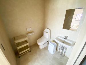 Ein Badezimmer in der Unterkunft SANDBoX