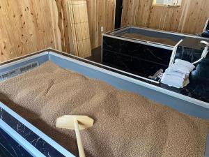 Postel nebo postele na pokoji v ubytování SANDBoX