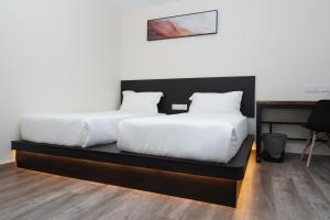 Postel nebo postele na pokoji v ubytování Anta Hotel