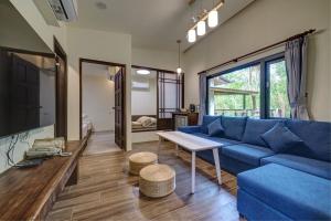 TV/Unterhaltungsangebot in der Unterkunft Zhou Ye Cottage
