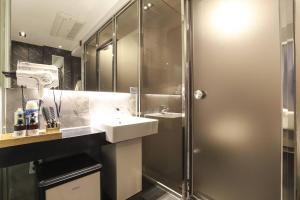 Koupelna v ubytování Hotel OSCAR