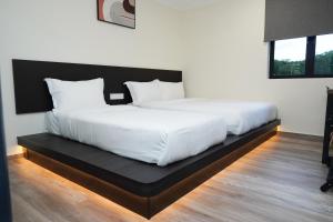 Postel nebo postele na pokoji v ubytování Anta Hotel