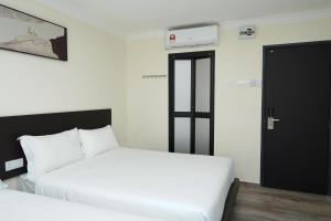 Postel nebo postele na pokoji v ubytování Anta Hotel