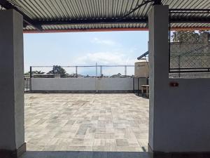 an open balcony with a view of the ocean at CENTRAL APARTMENT, casa cuc in Panajachel