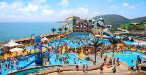 a large water park with a bunch of people in it at The Ocean Resort in Hangho +18 photos