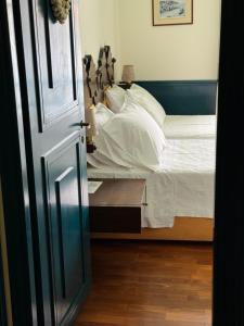 Voodi või voodid majutusasutuse Hotel Aliki toas