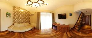 TV a/nebo společenská místnost v ubytování Hotel Papion