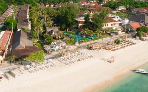 an aerial view of the beach at the resort at Vila Ombak in Gili Trawangan