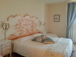Postel nebo postele na pokoji v ubytování B&B Corte Frisonai