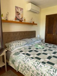 Postel nebo postele na pokoji v ubytování Marina Dor - Cala Egos- Sunny ground floor apartment with large garden