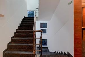 Fotografie z fotogalerie ubytování Super Townhouse Arcot Road Near Kauvery hospital v destinaci Čennaí