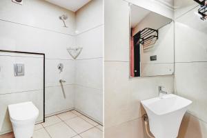 Vannituba majutusasutuses Super Townhouse Mysore Central