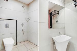 Vannituba majutusasutuses Super Townhouse Mysore Central