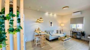 Posezení v ubytování Boho Nomad Seaview Detached House