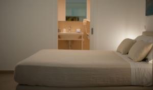 Кровать или кровати в номере Est hotel