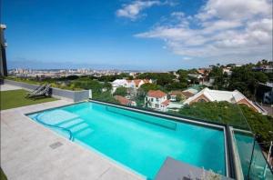 a swimming pool on the roof of a house at Unit 700 @2SIX2 on Florida in Durban