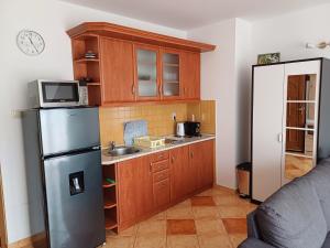 Kuchyňa alebo kuchynka v ubytovaní 4Season Apartman