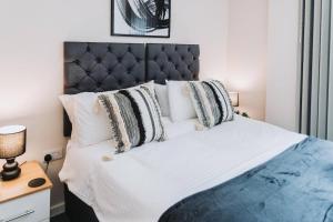 Ένα ή περισσότερα κρεβάτια σε δωμάτιο στο Apartment near Manchester Centre Ideal Sport or Gigs Sleeps 6 People