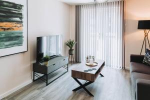 Μια τηλεόραση ή/και κέντρο ψυχαγωγίας στο Apartment near Manchester Centre Ideal Sport or Gigs Sleeps 6 People