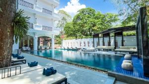 Bazén v ubytování Le Grande Indochine Hotel nebo v jeho okolí