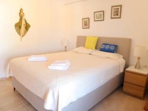 A bed or beds in a room at Summer Lovin Még 8 kép