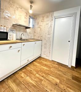 Η κουζίνα ή μικρή κουζίνα στο Guesthouse Ca'Artù