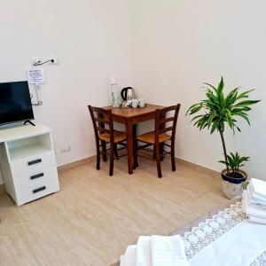 TV a/nebo společenská místnost v ubytování Sea Stone B&B