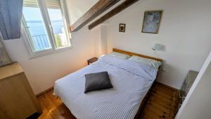 Postel nebo postele na pokoji v ubytování Paradies Apartments Prizba