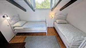 Postel nebo postele na pokoji v ubytování Paradies Apartments Prizba