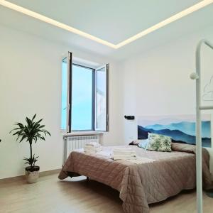 Postel nebo postele na pokoji v ubytování Sea Stone B&B