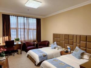 Postel nebo postele na pokoji v ubytování Chongqing Milky Way Hotel