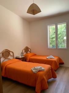 Ένα ή περισσότερα κρεβάτια σε δωμάτιο στο Lovely house with amazing sea view