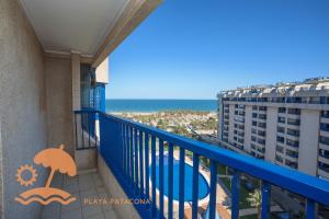 a balcony with a view of the beach at Patacona Resort Apartments Primera Linea in Valencia