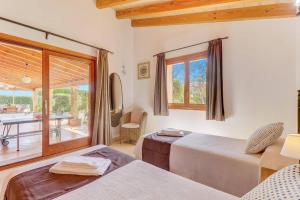 Postel nebo postele na pokoji v ubytování Villa Almadravet by Villa Plus