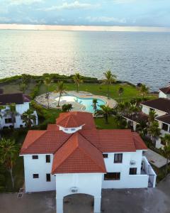 an aerial view of a house and the ocean at Uttoru Creek Villas-Nyali Mombasa in Mombasa