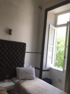 Voodi või voodid majutusasutuse Hotel velvet One toas