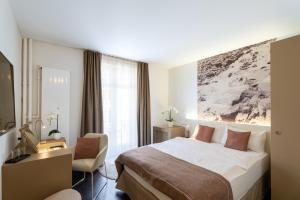 Letto o letti in una camera di Cascada Boutique Hotel