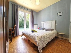 Postel nebo postele na pokoji v ubytování L'échappée du Canal - Piscine - Cheminée - Clim - Parking privé gratuit - 8 personnes - 3 chambres - Parc