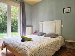 Postel nebo postele na pokoji v ubytování L'échappée du Canal - Piscine - Cheminée - Clim - Parking privé gratuit - 8 personnes - 3 chambres - Parc