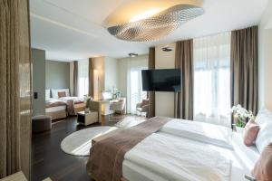 Postel nebo postele na pokoji v ubytování Cascada Boutique Hotel