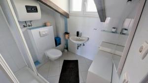 Koupelna v ubytování Paradies Apartments Prizba