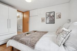 Postelja oz. postelje v sobi nastanitve INN JOY Apartments - idyllische Bergsicht