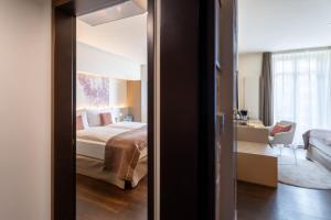 Letto o letti in una camera di Cascada Boutique Hotel