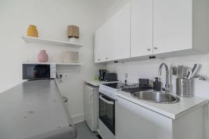 Η κουζίνα ή μικρή κουζίνα στο Orleans - Paris Neuilly 4Pax