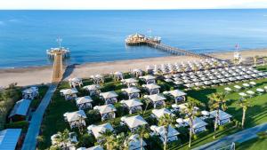 an aerial view of a resort with a pier at Calista Luxury Resort in Belek +229 photos