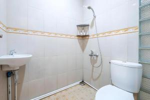 Vannituba majutusasutuses OYO Collection O 1032 Rahayu Residence Syariah