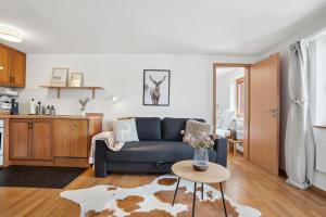 Kuhinja oz. manjša kuhinja v nastanitvi INN JOY Apartments - idyllische Bergsicht