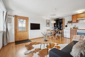 Kuhinja oz. manjša kuhinja v nastanitvi INN JOY Apartments - idyllische Bergsicht