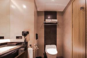 Koupelna v ubytování FUGO Hotel Banjarmasin